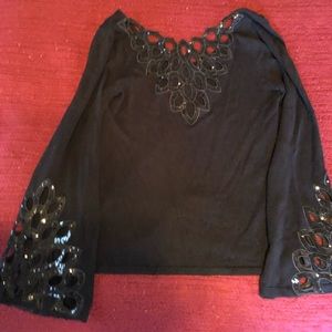 Beautiful reversible black top with sequin trim